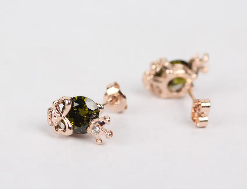 Fashionable Crystal Crown Skull Stud Earrings - Mystic Edge